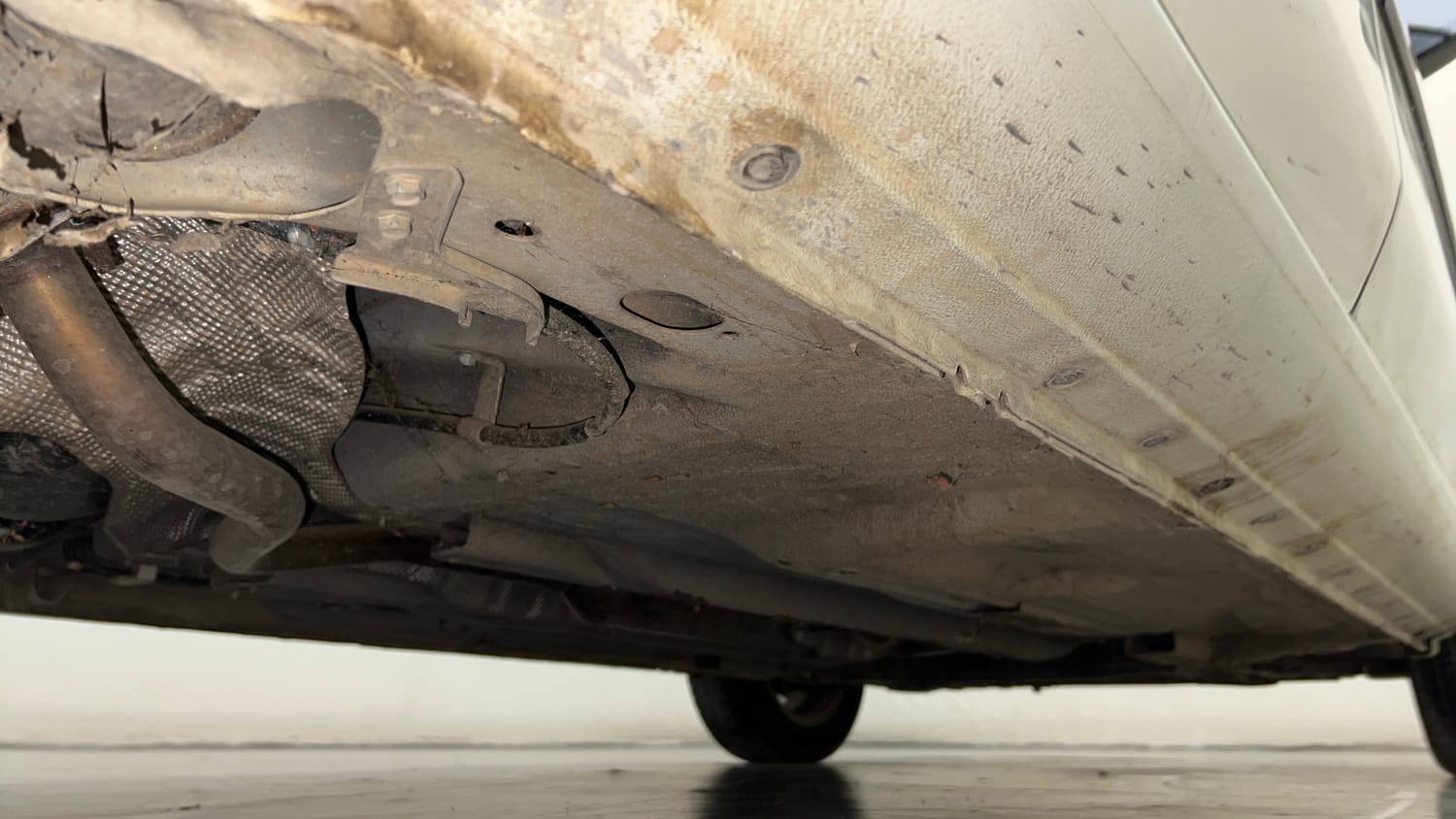 Used 2018 Nissan Sunny XV CVT Petrol Automatic extra REAR RIGHT UNDERBODY VIEW