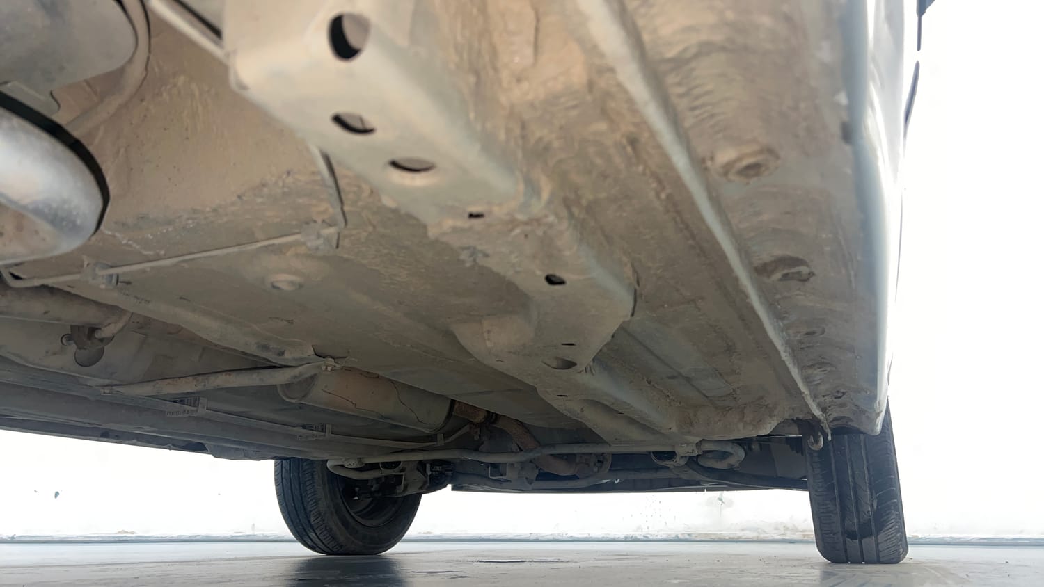 Used 2019 Tata Tiago Revotron XZ w/o Alloy Petrol Manual extra REAR RIGHT UNDERBODY VIEW