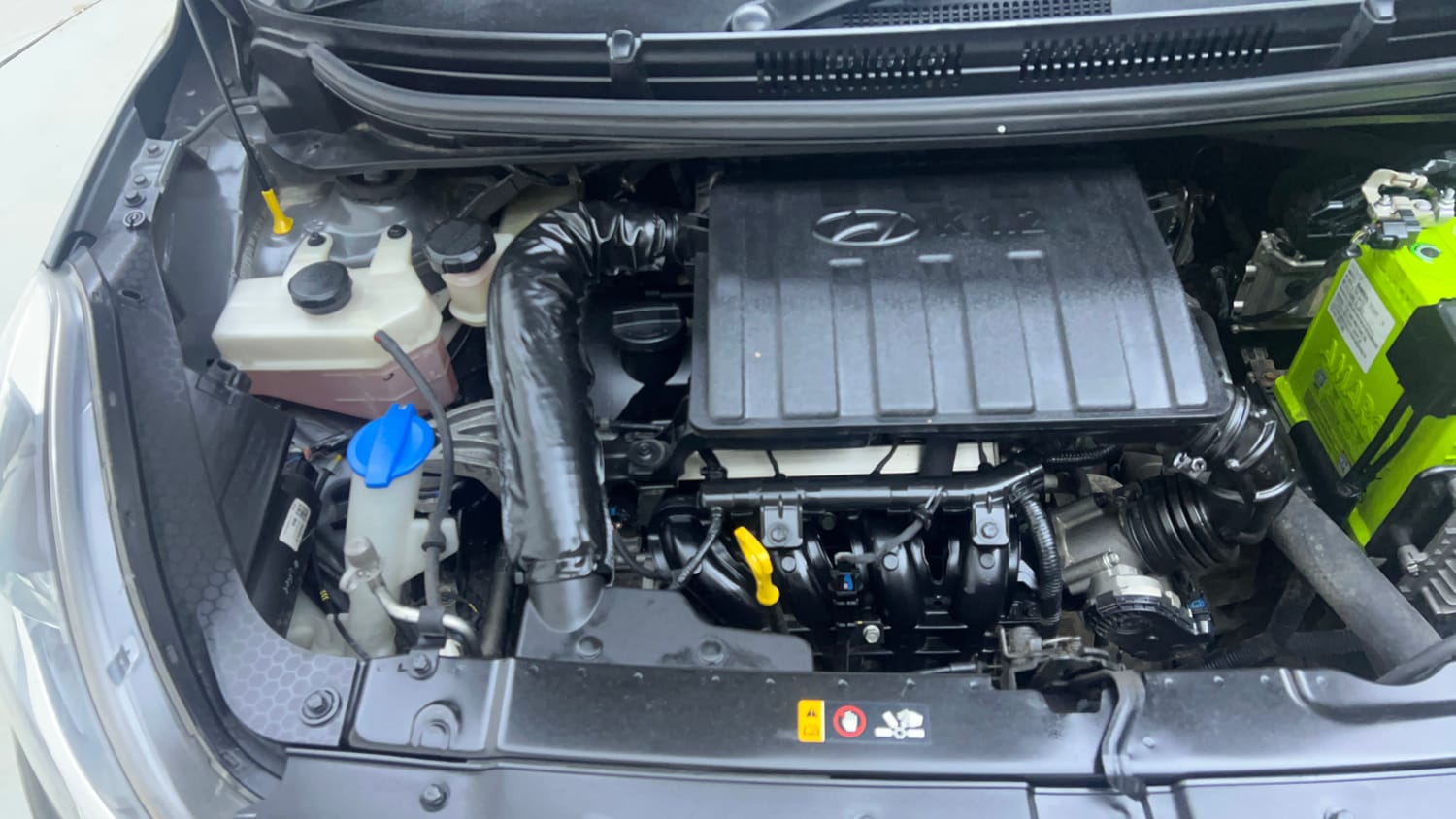 Used 2022 Hyundai Aura SX Plus 1.2 AMT Petrol Petrol Automatic engine ENGINE RIGHT SIDE VIEW
