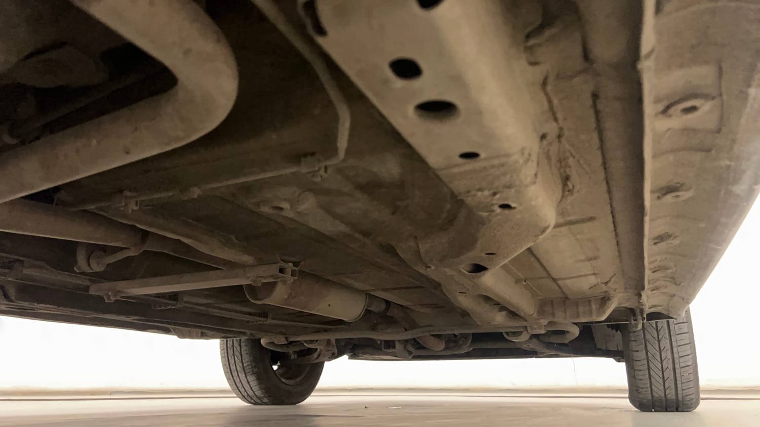 Used 2016 Tata Tiago Revotron XT Petrol Manual extra REAR RIGHT UNDERBODY VIEW