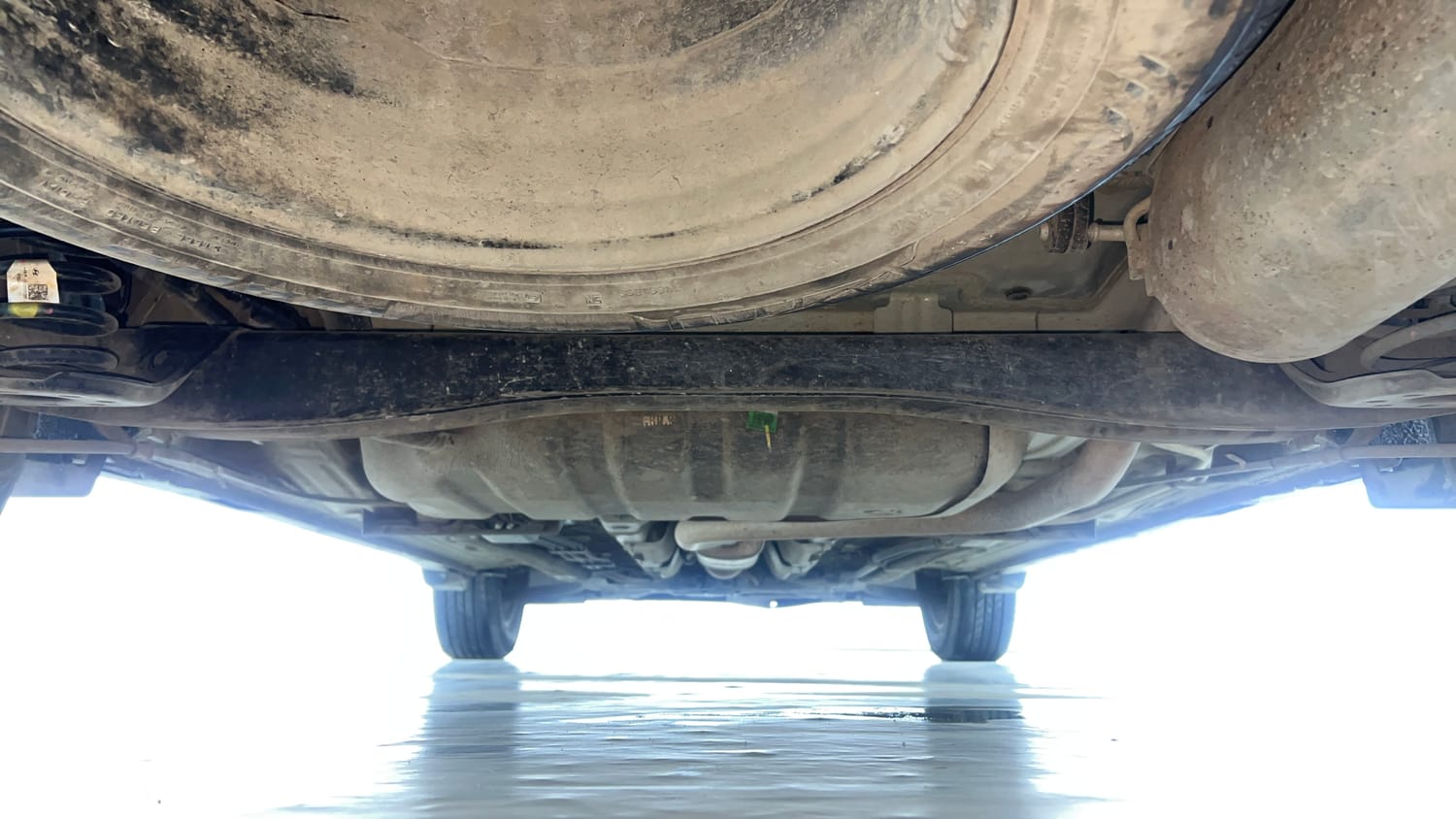 Used 2022 Kia Carens Prestige Plus 1.4 Petrol MT 7 STR Petrol Manual extra REAR UNDERBODY VIEW (TAKEN FROM REAR)