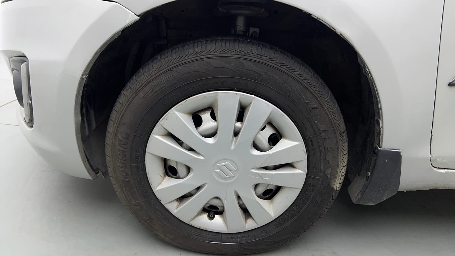 Used 2017 Maruti Suzuki Swift LXi (O) Petrol Manual tyres LEFT FRONT TYRE RIM VIEW