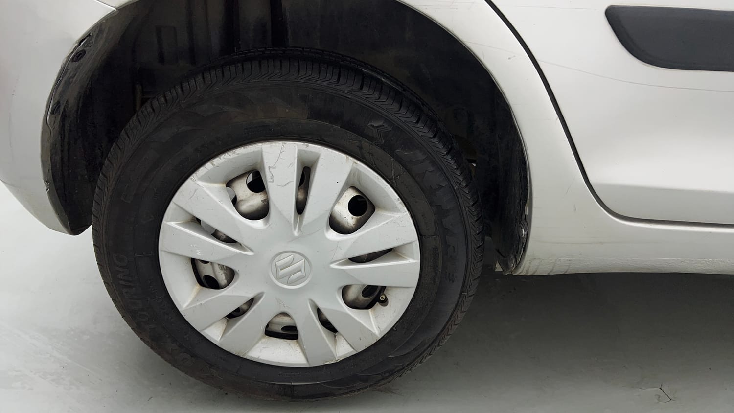 Used 2017 Maruti Suzuki Swift LXi (O) Petrol Manual tyres RIGHT REAR TYRE RIM VIEW