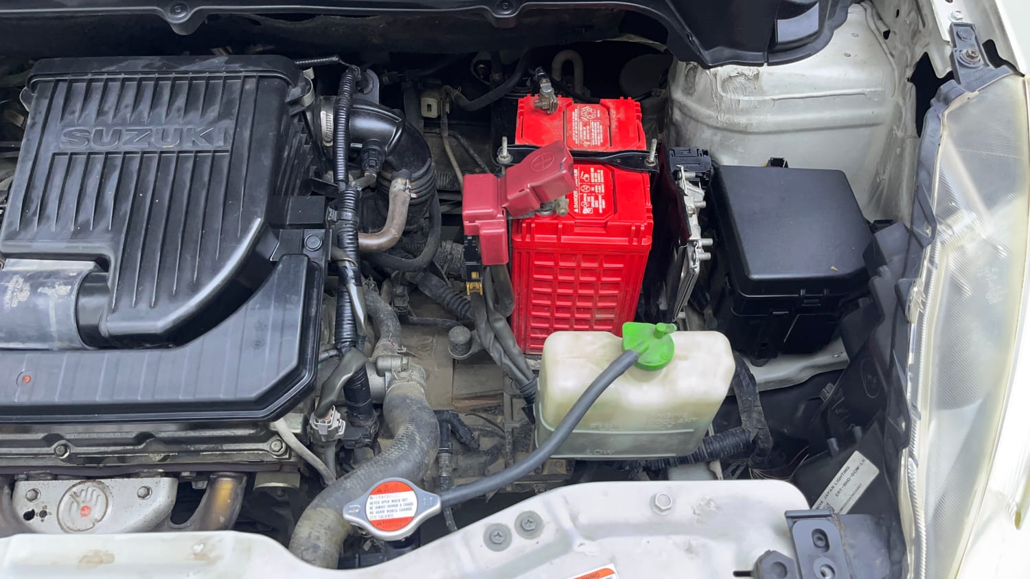 Used 2014 Maruti Suzuki Ertiga Vxi Petrol Manual engine ENGINE LEFT SIDE VIEW