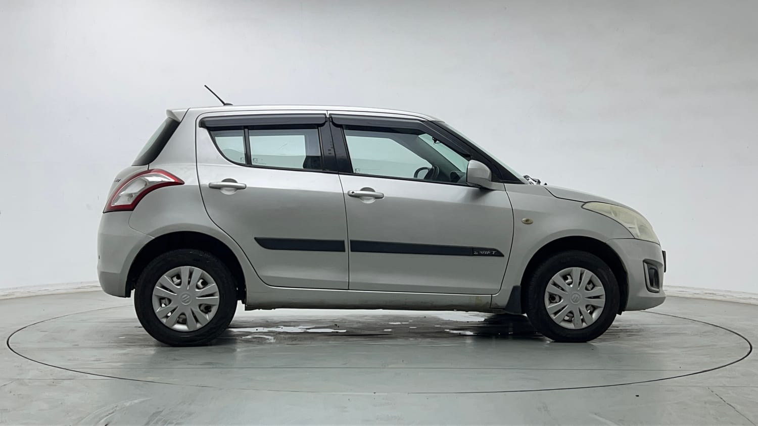 Used 2017 Maruti Suzuki Swift LXi (O) Petrol Manual exterior RIGHT SIDE VIEW