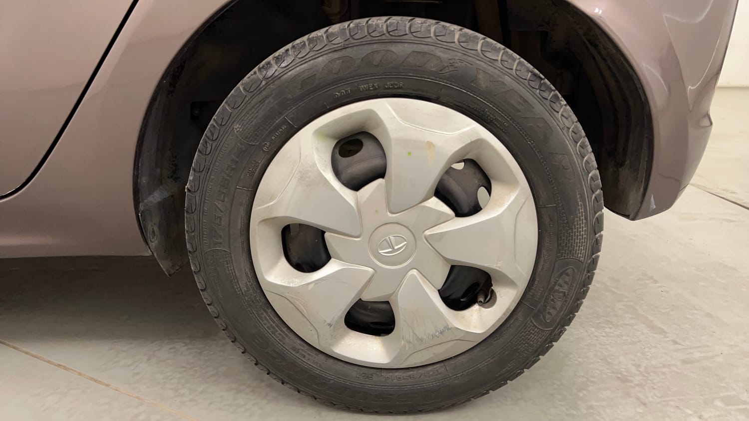 Used 2016 Tata Tiago Revotron XT Petrol Manual tyres LEFT REAR TYRE RIM VIEW
