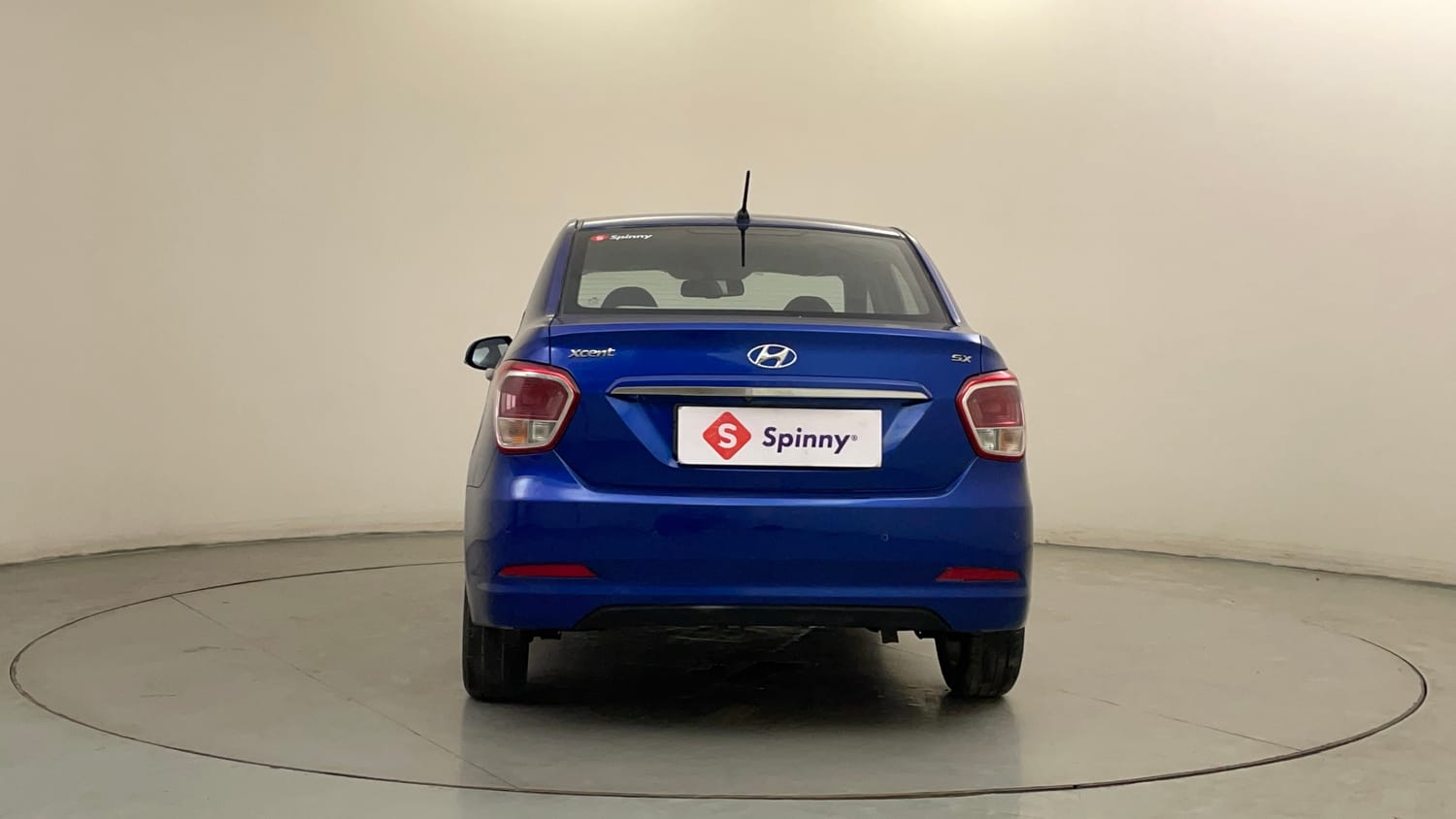 Used 2015 Hyundai Xcent SX 1.2 (O) Petrol Manual exterior BACK VIEW