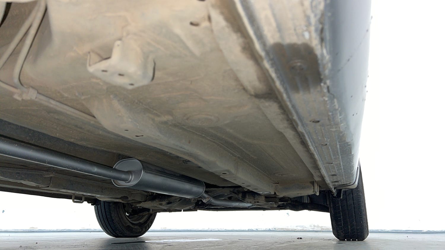 Used 2014 Maruti Suzuki Celerio VXi AMT Petrol Automatic extra REAR RIGHT UNDERBODY VIEW