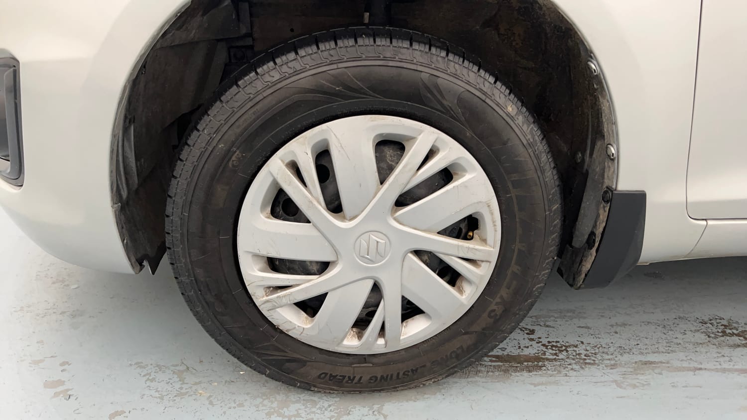 Used 2015 Maruti Suzuki Swift VXi Petrol Manual tyres LEFT FRONT TYRE RIM VIEW