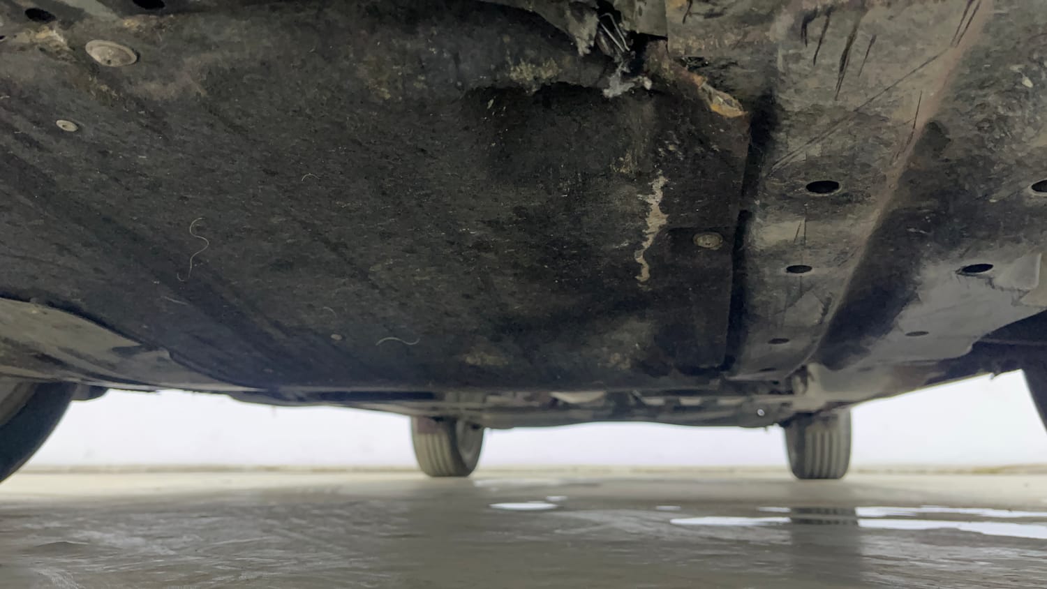 Used 2024 Maruti Suzuki Baleno Zeta AGS Petrol Automatic extra FRONT LEFT UNDERBODY VIEW