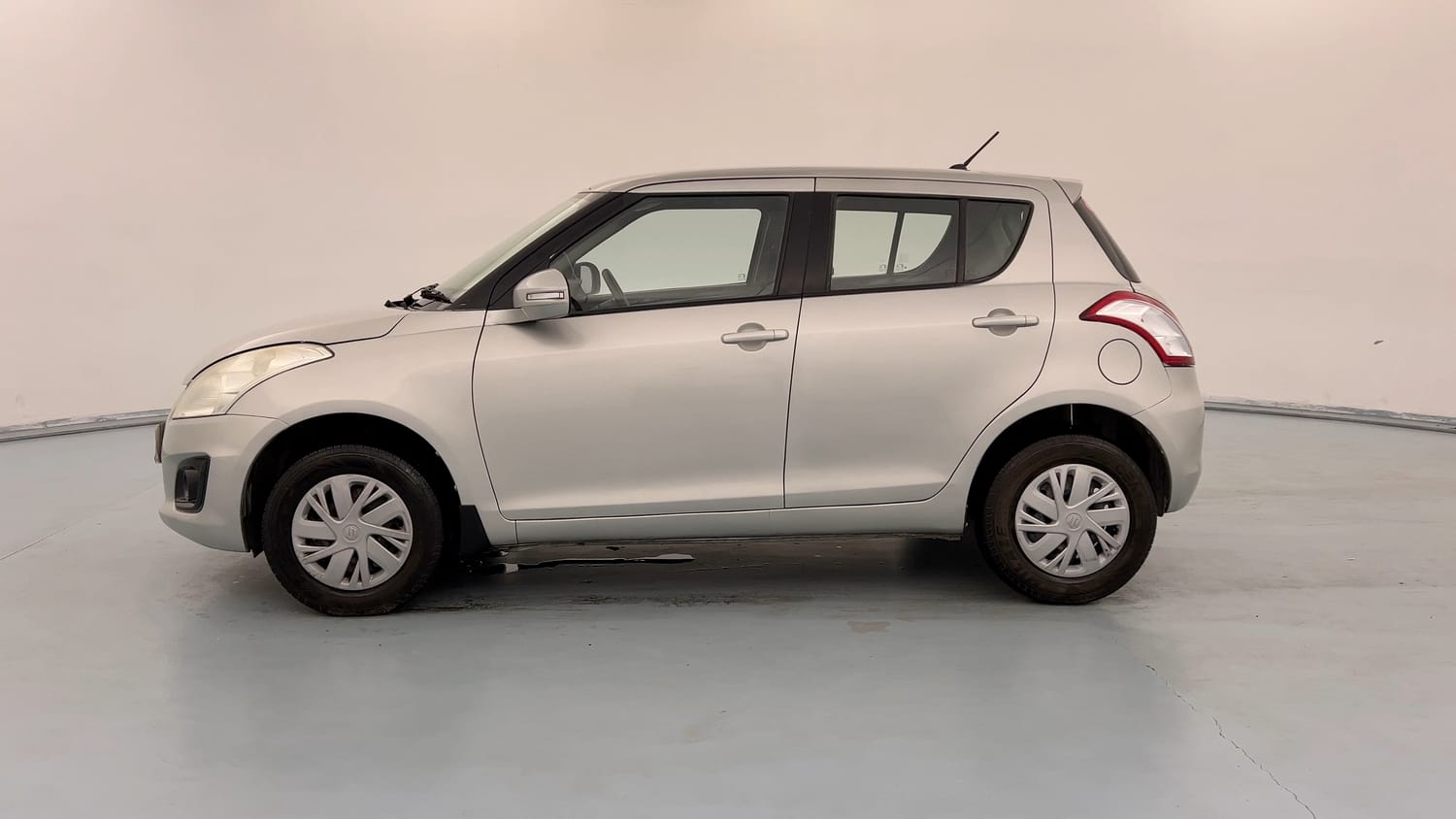 Used 2015 Maruti Suzuki Swift VXi Petrol Manual exterior LEFT SIDE VIEW