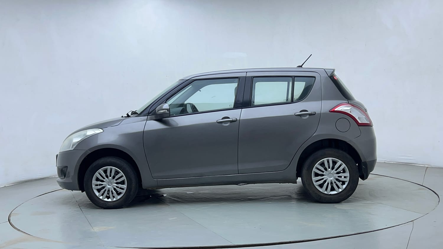 Used 2012 Maruti Suzuki Swift VXi Petrol Manual exterior LEFT SIDE VIEW