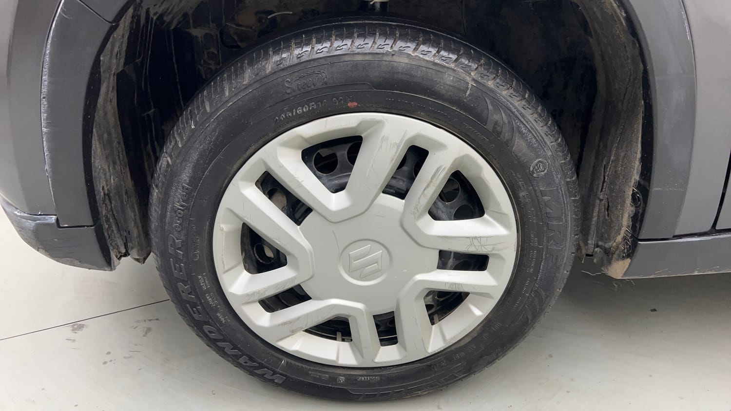 Used 2021 maruti-suzuki Vitara Brezza VXi Petrol Manual tyres LEFT FRONT TYRE RIM VIEW