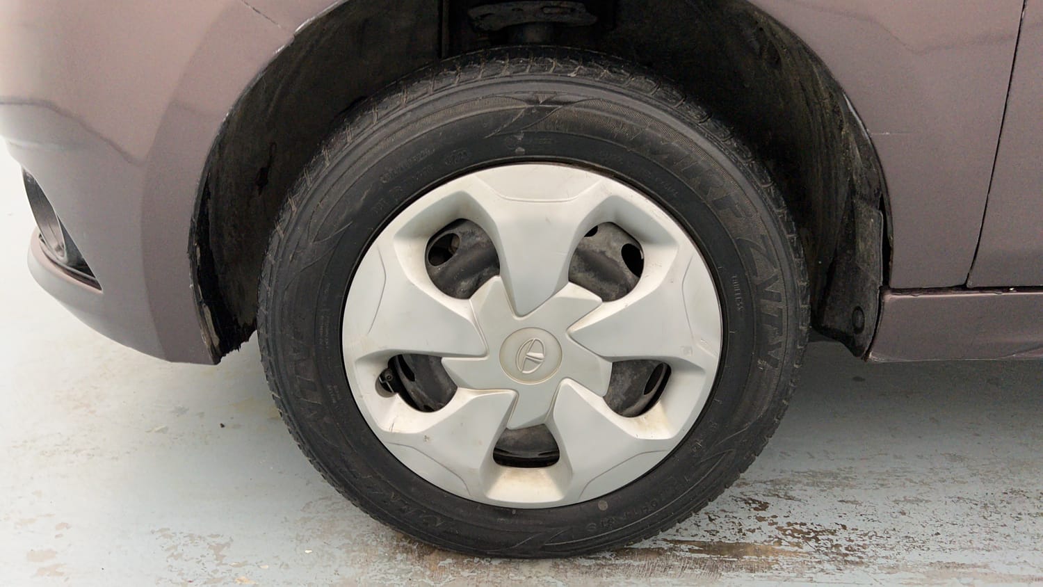 Used 2019 Tata Tiago Revotron XT Petrol Manual tyres LEFT FRONT TYRE RIM VIEW
