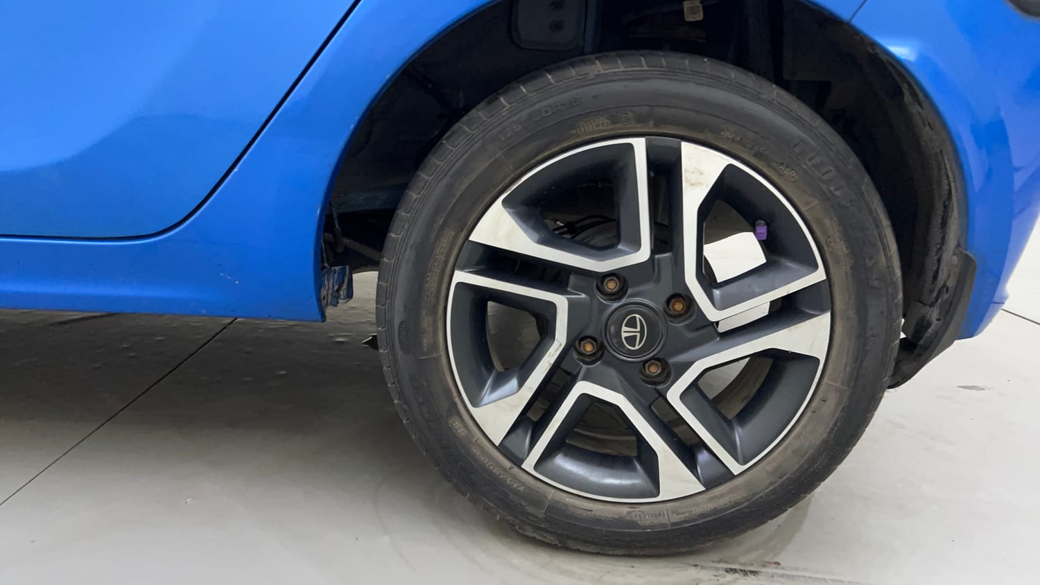 Used 2021 Tata Tiago XZ Plus Petrol Manual tyres LEFT REAR TYRE RIM VIEW