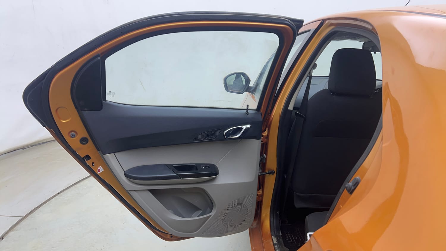 Used 2016 Tata Tiago Revotron XZ Petrol Manual interior LEFT REAR DOOR OPEN VIEW