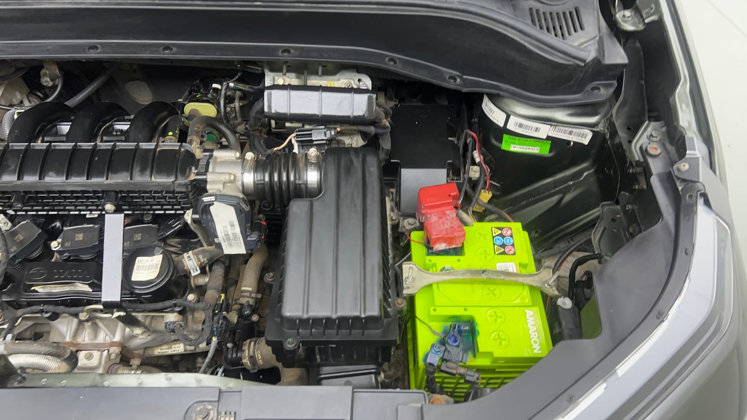 Used 2023 Tata Punch Camo Adventure Rhythm AMT Petrol Automatic engine ENGINE LEFT SIDE VIEW