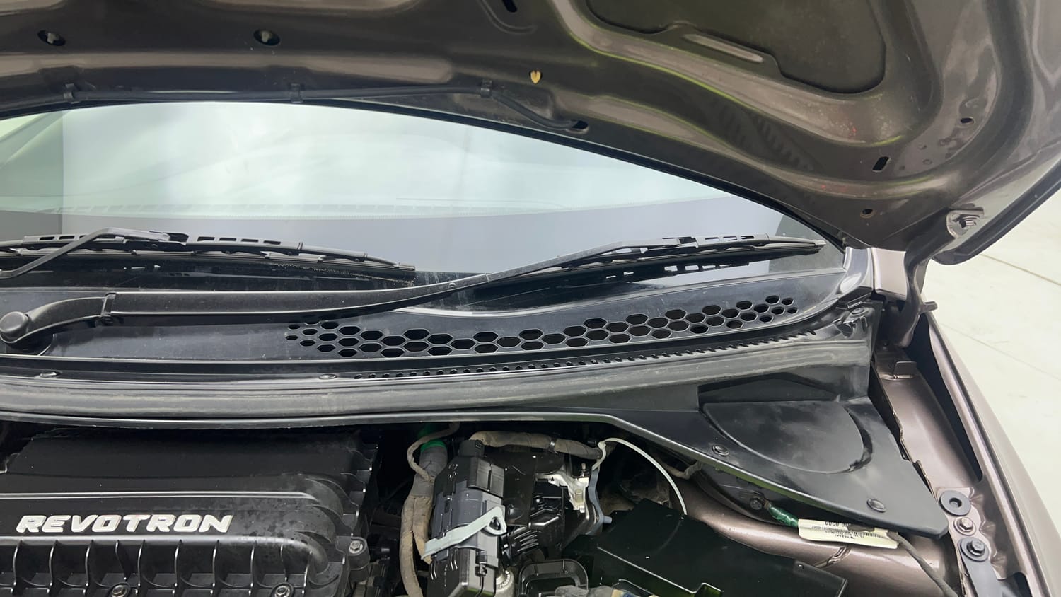 Used 2018 Tata Tiago XZ W/O Alloy Petrol + CNG(Outside Fitted) Cng Manual engine ENGINE LEFT SIDE HINGE & APRON VIEW