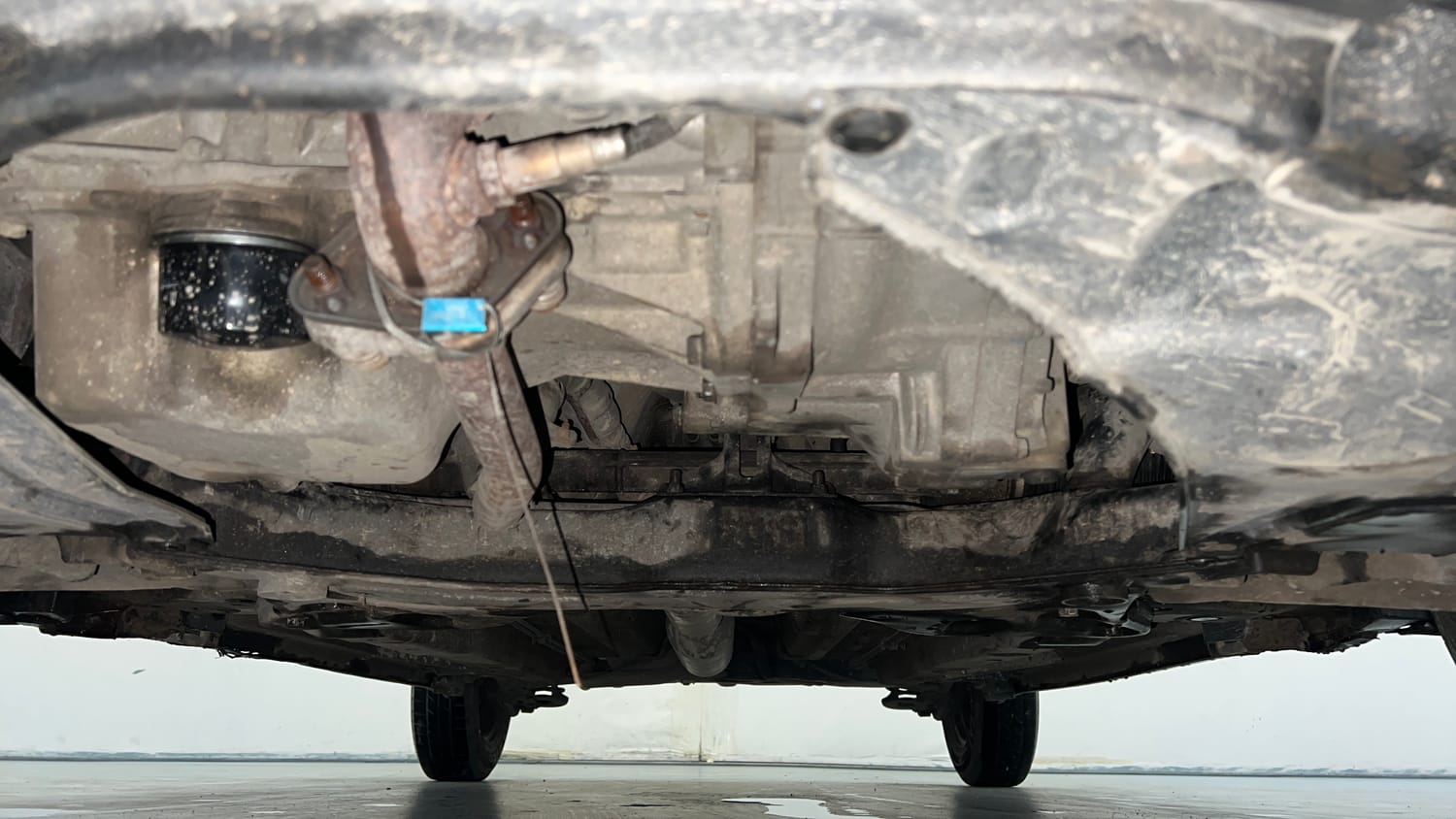 Used 2015 Maruti Suzuki Swift VXi Petrol Manual extra FRONT LEFT UNDERBODY VIEW