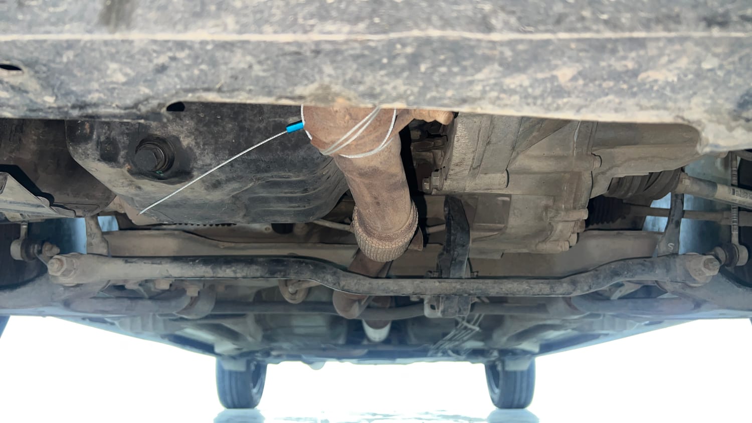 Used 2018 Tata Tiago XZ W/O Alloy Petrol + CNG(Outside Fitted) Cng Manual extra FRONT LEFT UNDERBODY VIEW