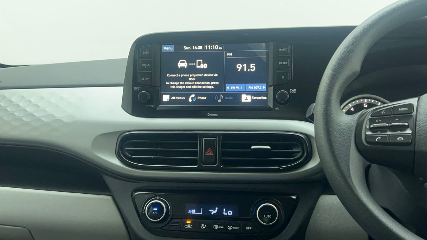 Used 2020 Hyundai Grand i10 Nios Sportz AMT 1.2 Kappa VTVT Petrol Automatic top_features Integrated (in-dash) music system