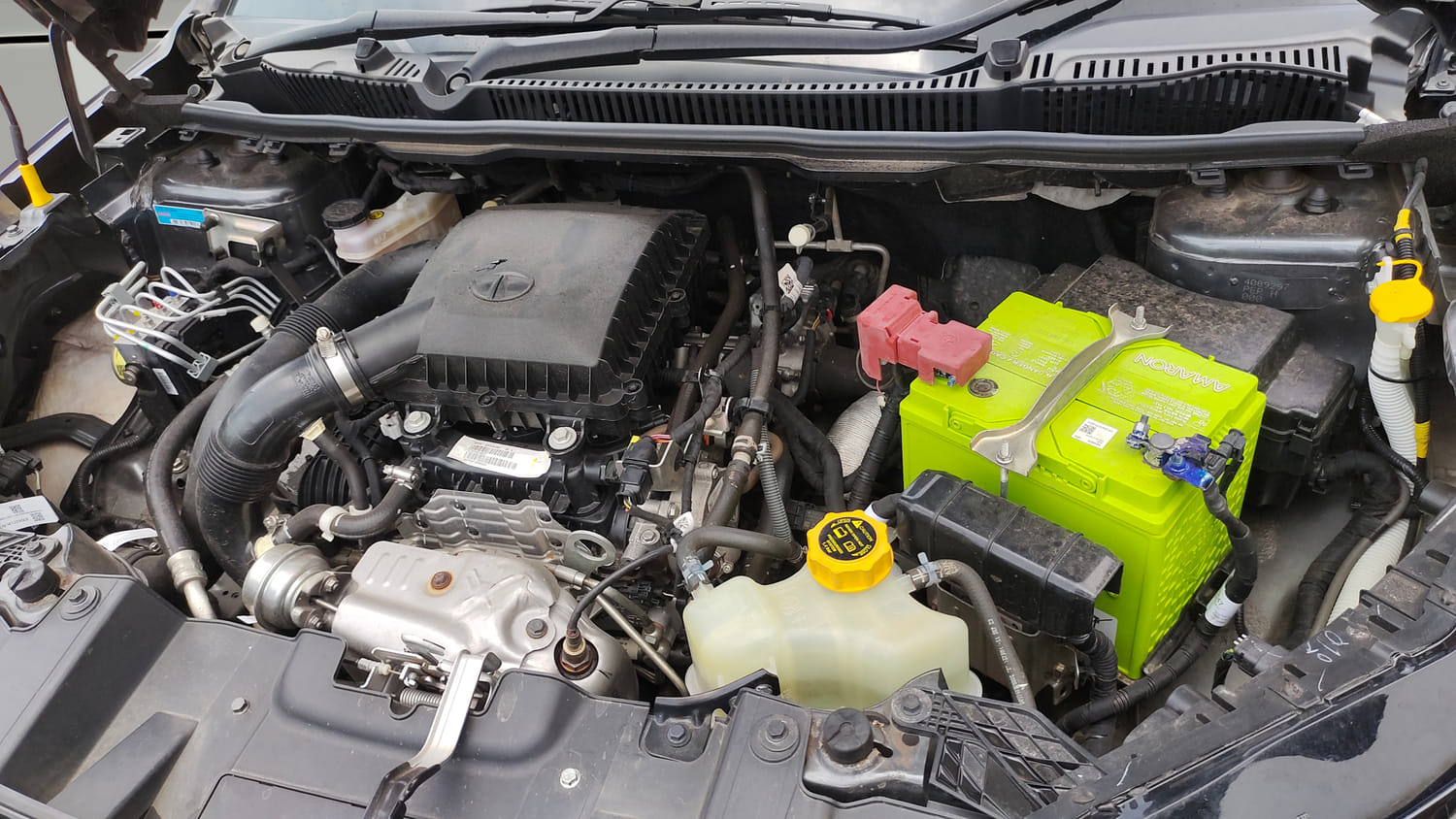 Used 2023 Tata Nexon Creative Plus S 1.2 Revotron Petrol 7DCA Petrol Automatic engine ENGINE LEFT SIDE VIEW