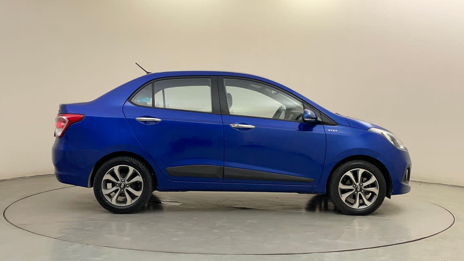 Used 2015 Hyundai Xcent SX 1.2 (O) Petrol Manual exterior RIGHT SIDE VIEW