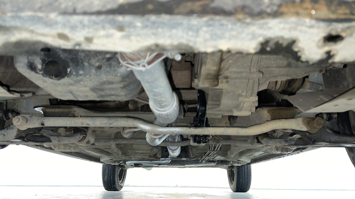 Used 2019 Tata Tiago Revotron XT Petrol Manual extra FRONT LEFT UNDERBODY VIEW