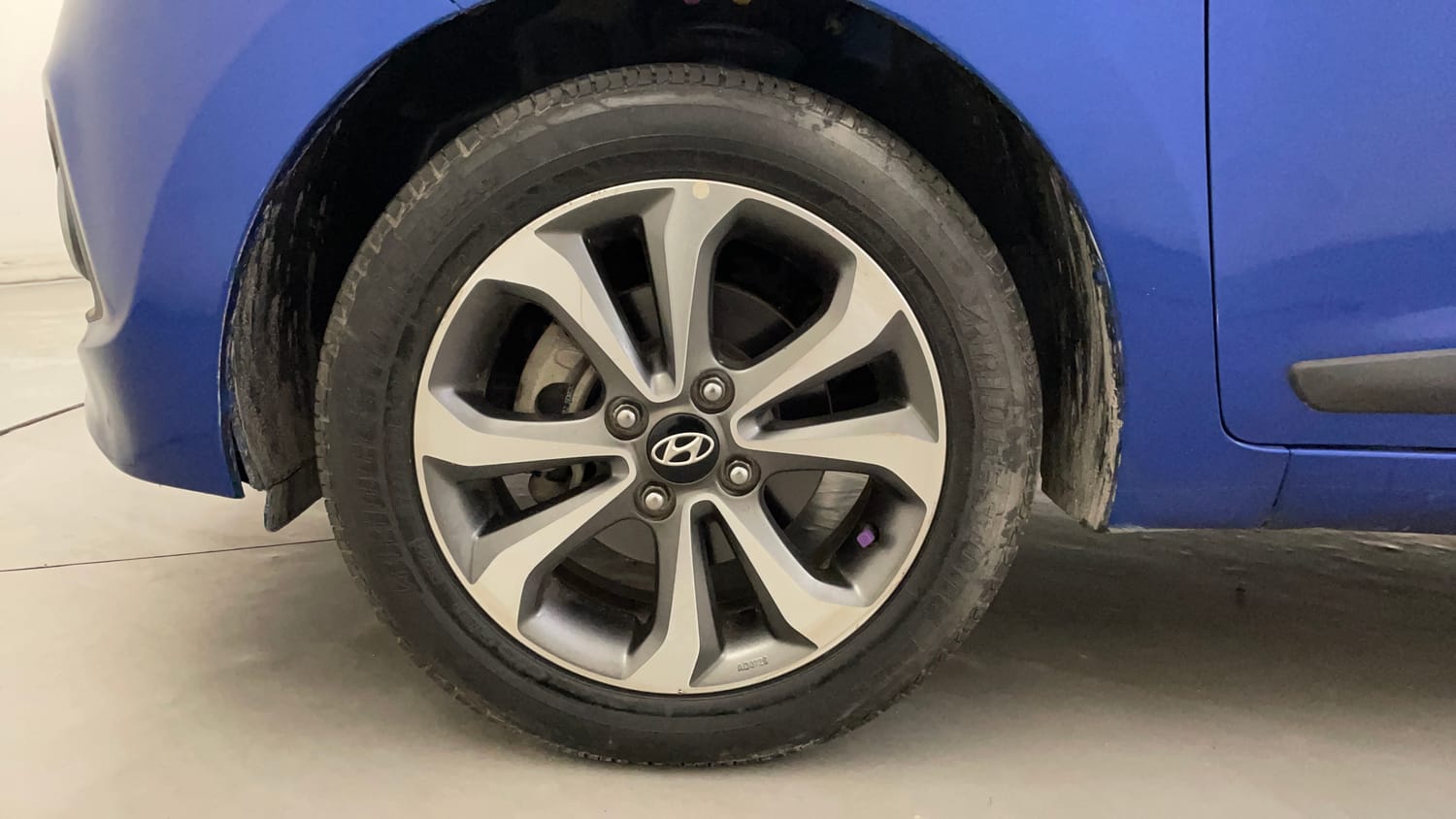 Used 2015 Hyundai Xcent SX 1.2 (O) Petrol Manual tyres LEFT FRONT TYRE RIM VIEW