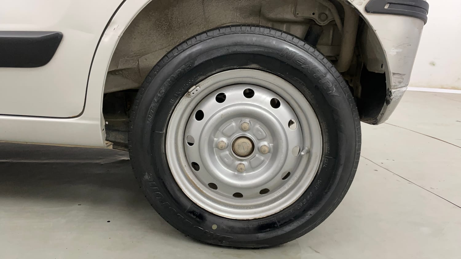 Used 2021 Maruti Suzuki Wagon R LXI Petrol Manual tyres LEFT REAR TYRE RIM VIEW