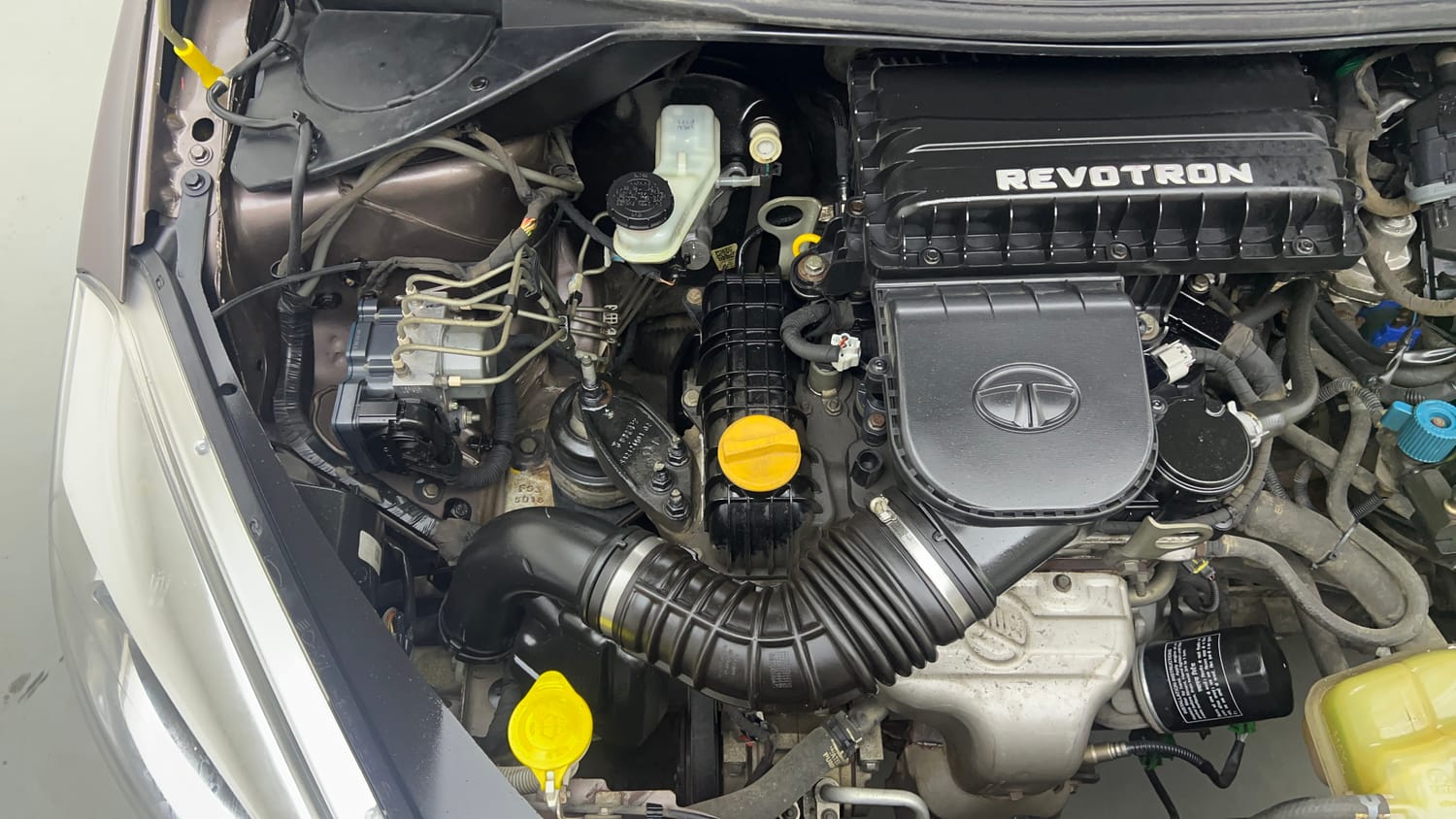 Used 2018 Tata Tiago XZ W/O Alloy Petrol + CNG(Outside Fitted) Cng Manual engine ENGINE RIGHT SIDE VIEW