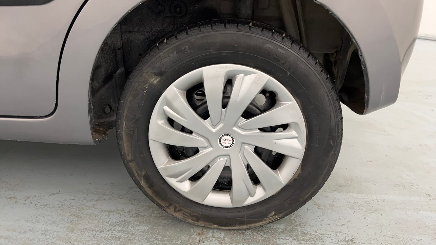 Used 2014 Maruti Suzuki Celerio VXi AMT Petrol Automatic tyres LEFT REAR TYRE RIM VIEW