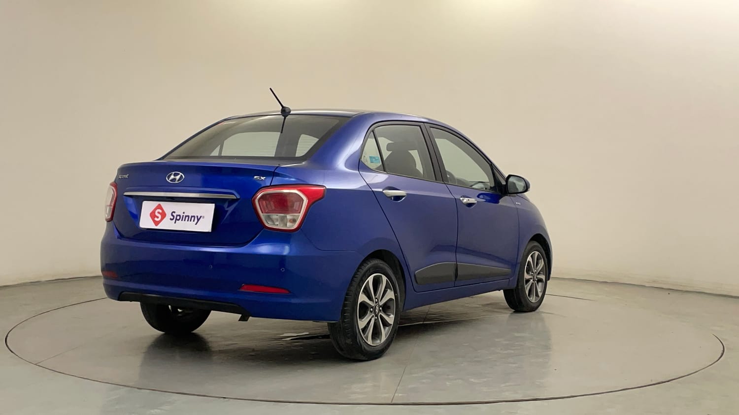 Used 2015 Hyundai Xcent SX 1.2 (O) Petrol Manual exterior RIGHT REAR CORNER VIEW
