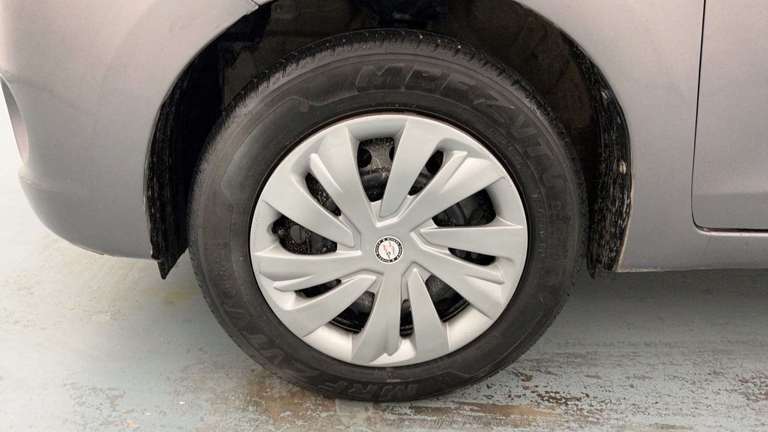 Used 2014 Maruti Suzuki Celerio VXi AMT Petrol Automatic tyres LEFT FRONT TYRE RIM VIEW