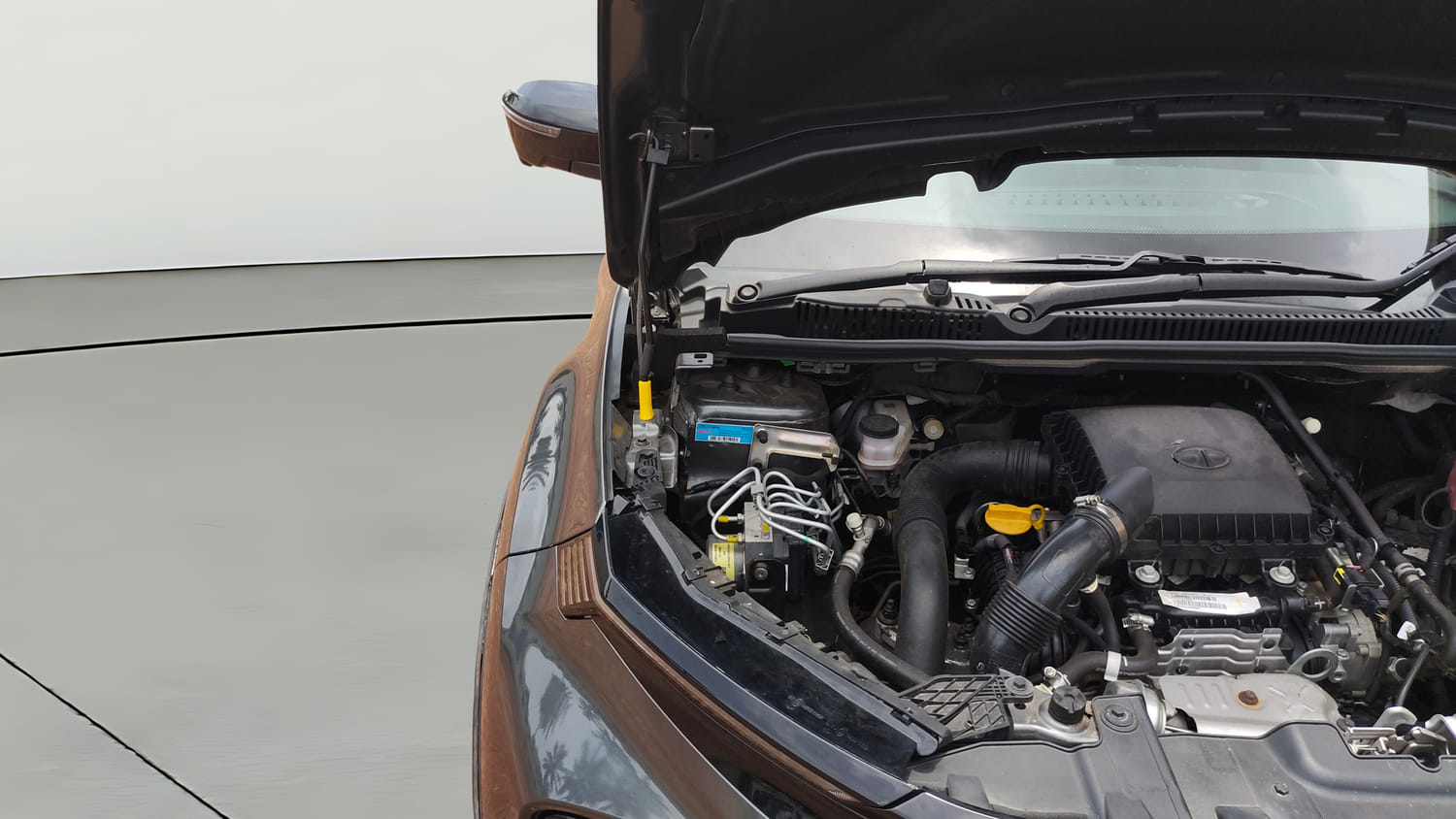 Used 2023 Tata Nexon Creative Plus S 1.2 Revotron Petrol 7DCA Petrol Automatic engine ENGINE RIGHT SIDE HINGE & APRON VIEW