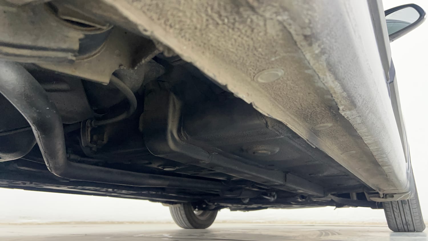 Used 2017 Hyundai Grand i10 Sportz (O) AT 1.2 Kappa VTVT Petrol Automatic extra REAR RIGHT UNDERBODY VIEW