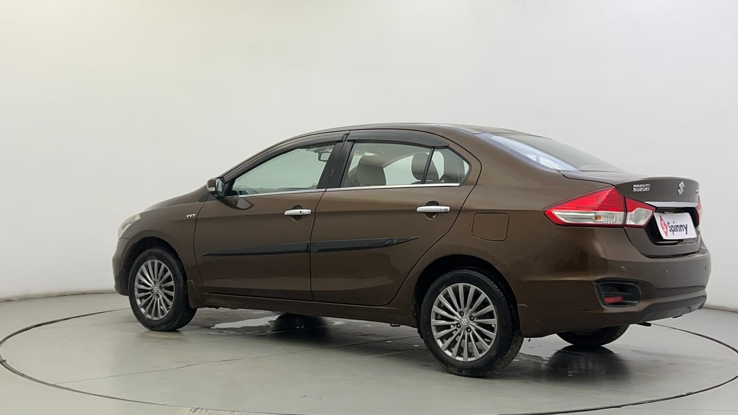 Used 2015 Maruti Suzuki Ciaz ZXI+ Petrol Manual exterior LEFT REAR CORNER VIEW