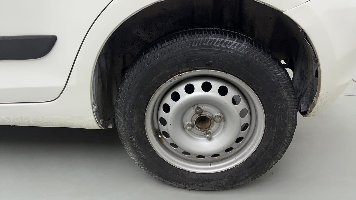 Used 2017 Maruti Suzuki Swift Lxi (O) Petrol Manual tyres LEFT REAR TYRE RIM VIEW
