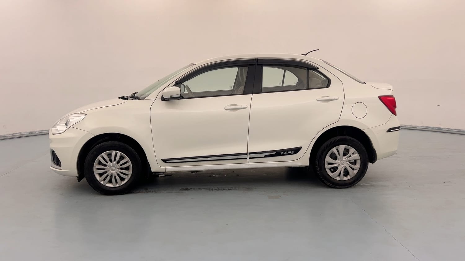 Used 2021 Maruti Suzuki Dzire VXi Petrol Manual exterior LEFT SIDE VIEW