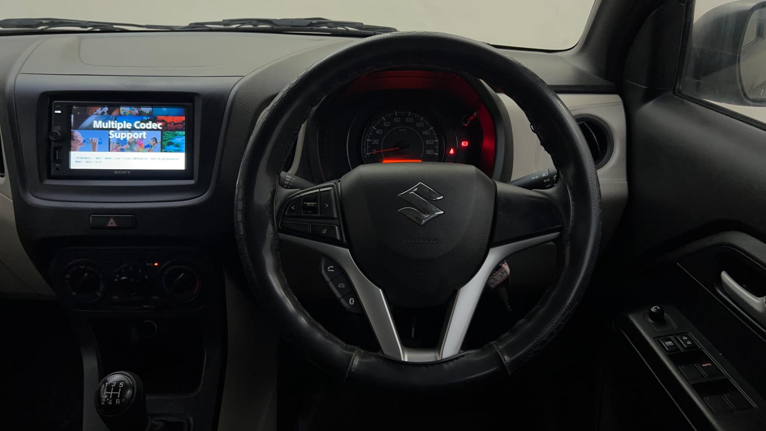 Used 2021 Maruti Suzuki Wagon R VXi (O) 1.2 Petrol Manual top_features Steering mounted controls