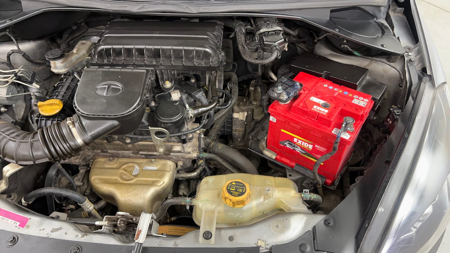 Used 2019 Tata Tigor Revotron XZA Petrol Automatic engine ENGINE LEFT SIDE VIEW