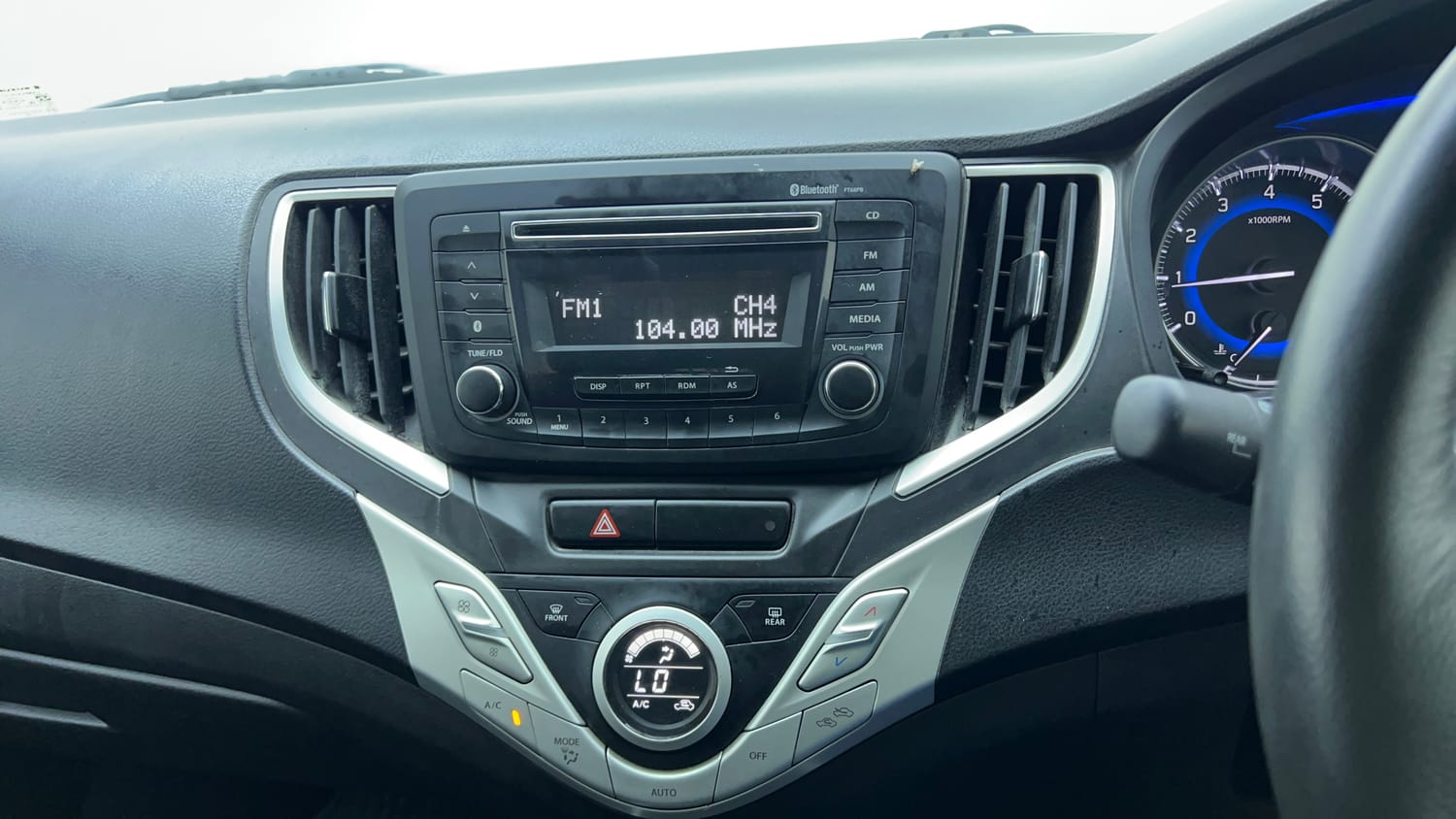 Used 2018 Maruti Suzuki Baleno Delta 1.2 Petrol Manual top_features Integrated (in-dash) music system