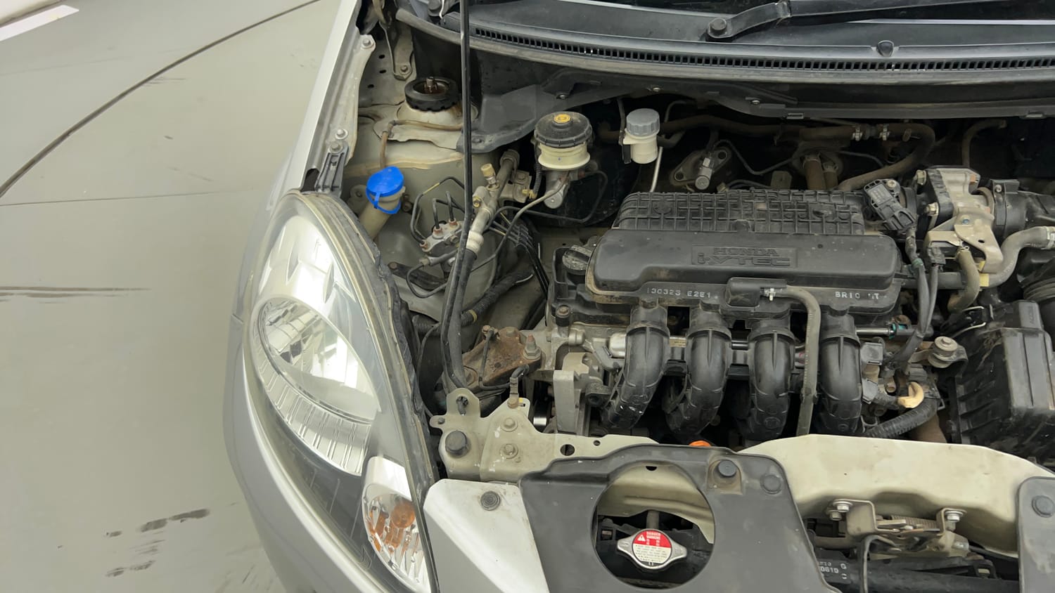 Used 2013 Honda Brio S MT Petrol Manual engine ENGINE RIGHT SIDE VIEW