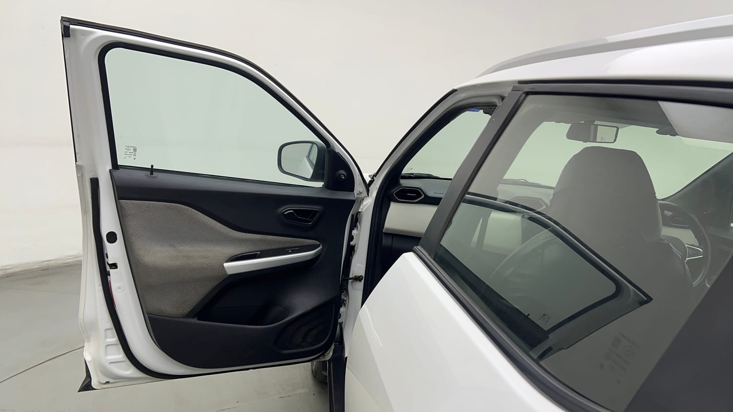 Used 2021 Nissan Magnite XE Petrol Manual interior LEFT FRONT DOOR OPEN VIEW