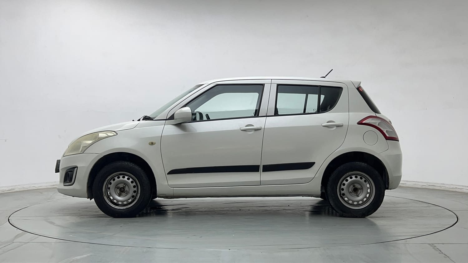 Used 2017 Maruti Suzuki Swift Lxi (O) Petrol Manual exterior LEFT SIDE VIEW