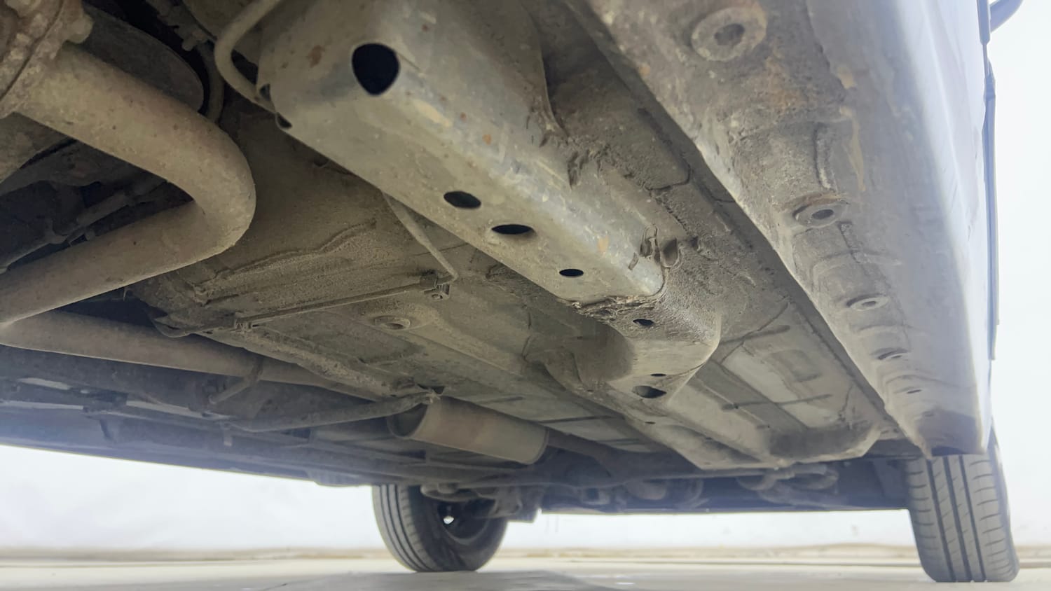 Used 2022 Tata Tigor XMA Petrol Automatic extra REAR RIGHT UNDERBODY VIEW