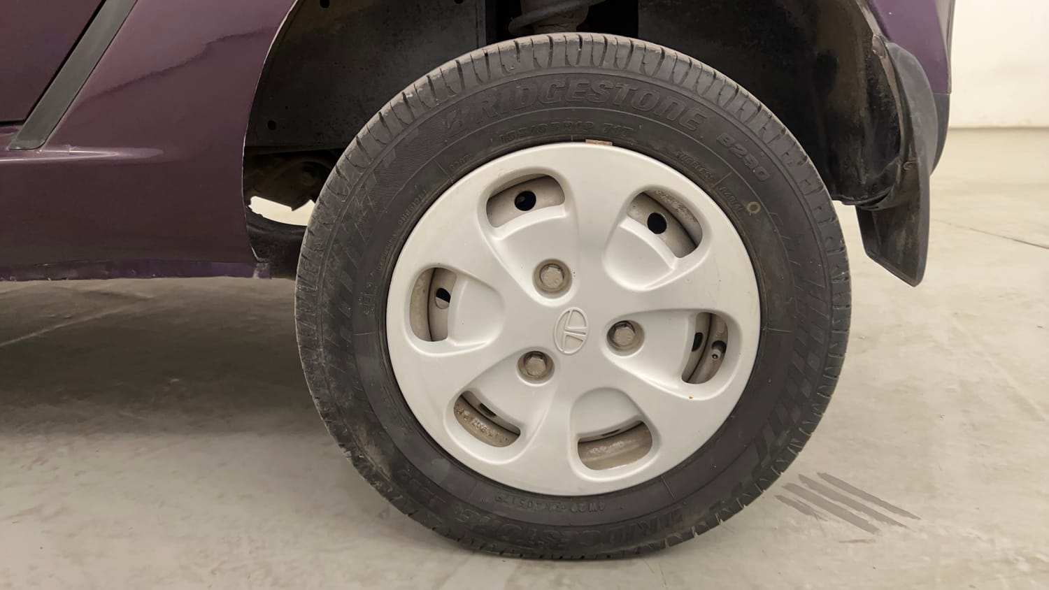 Used 2015 Tata Nano Twist XT Petrol Manual tyres LEFT REAR TYRE RIM VIEW