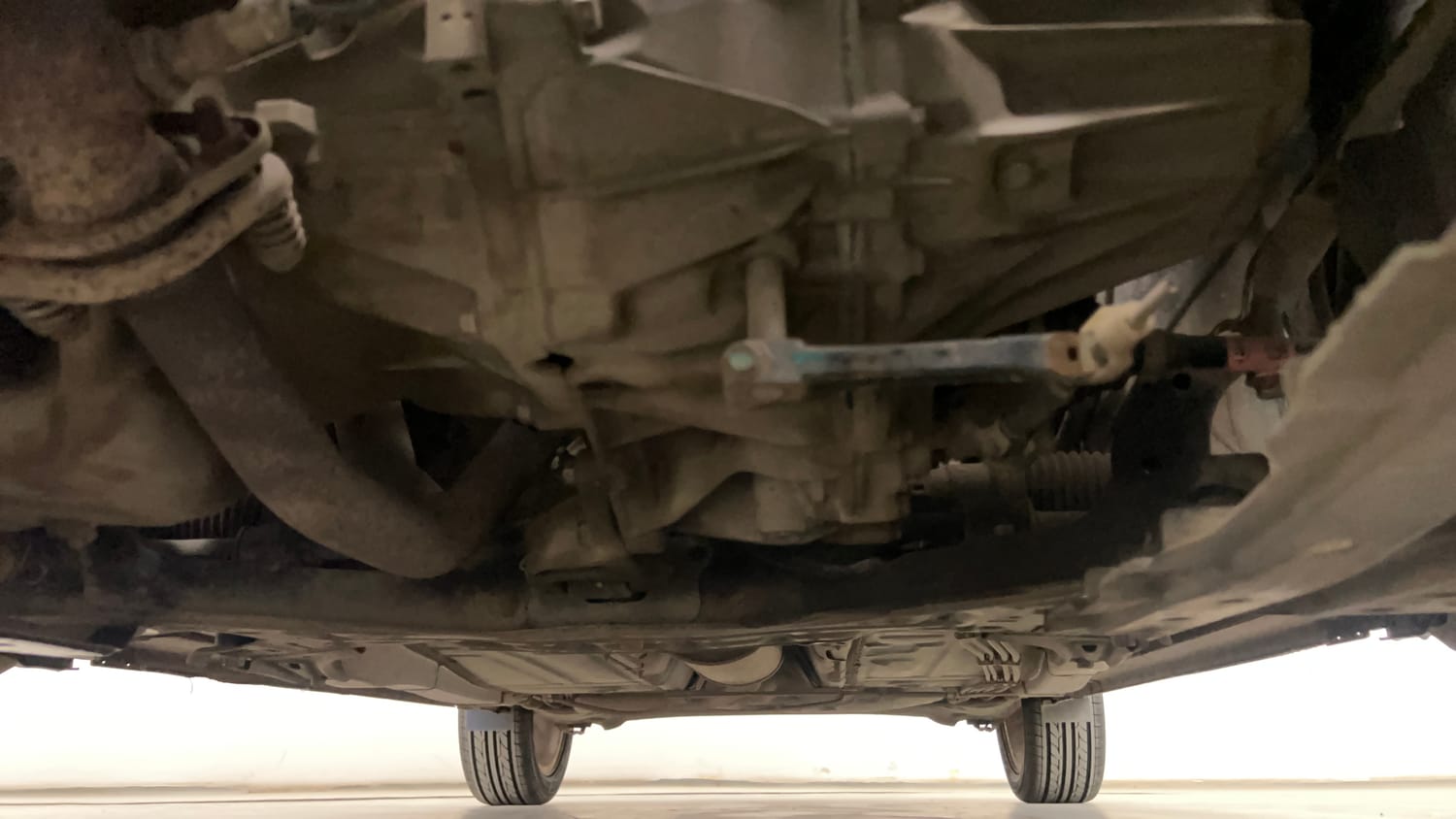 Used 2020 Maruti Suzuki Baleno Zeta Petrol Manual extra FRONT LEFT UNDERBODY VIEW