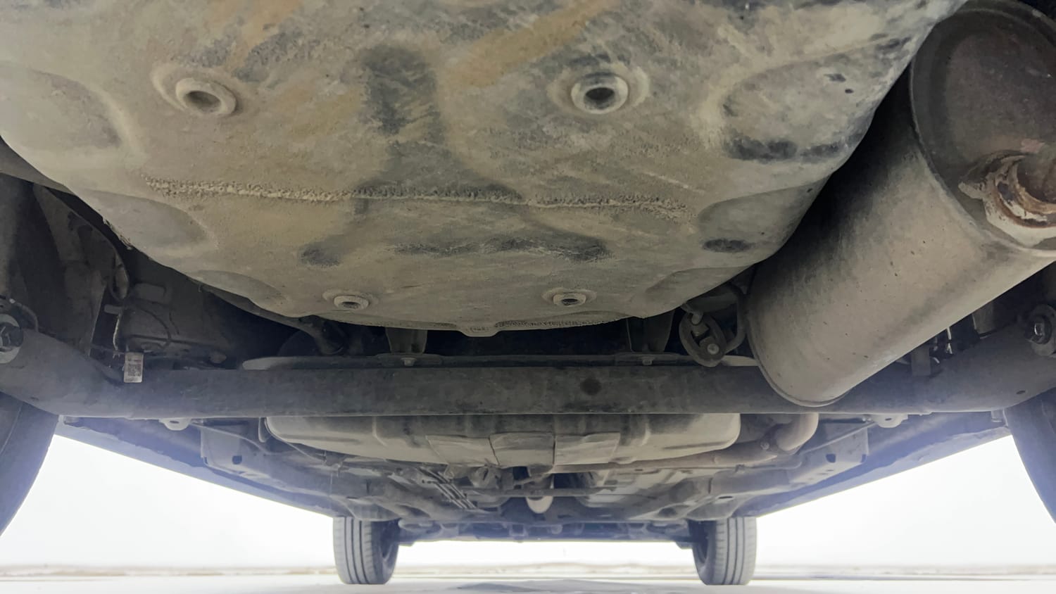 Used 2022 Tata Tigor XMA Petrol Automatic extra REAR UNDERBODY VIEW (TAKEN FROM REAR)