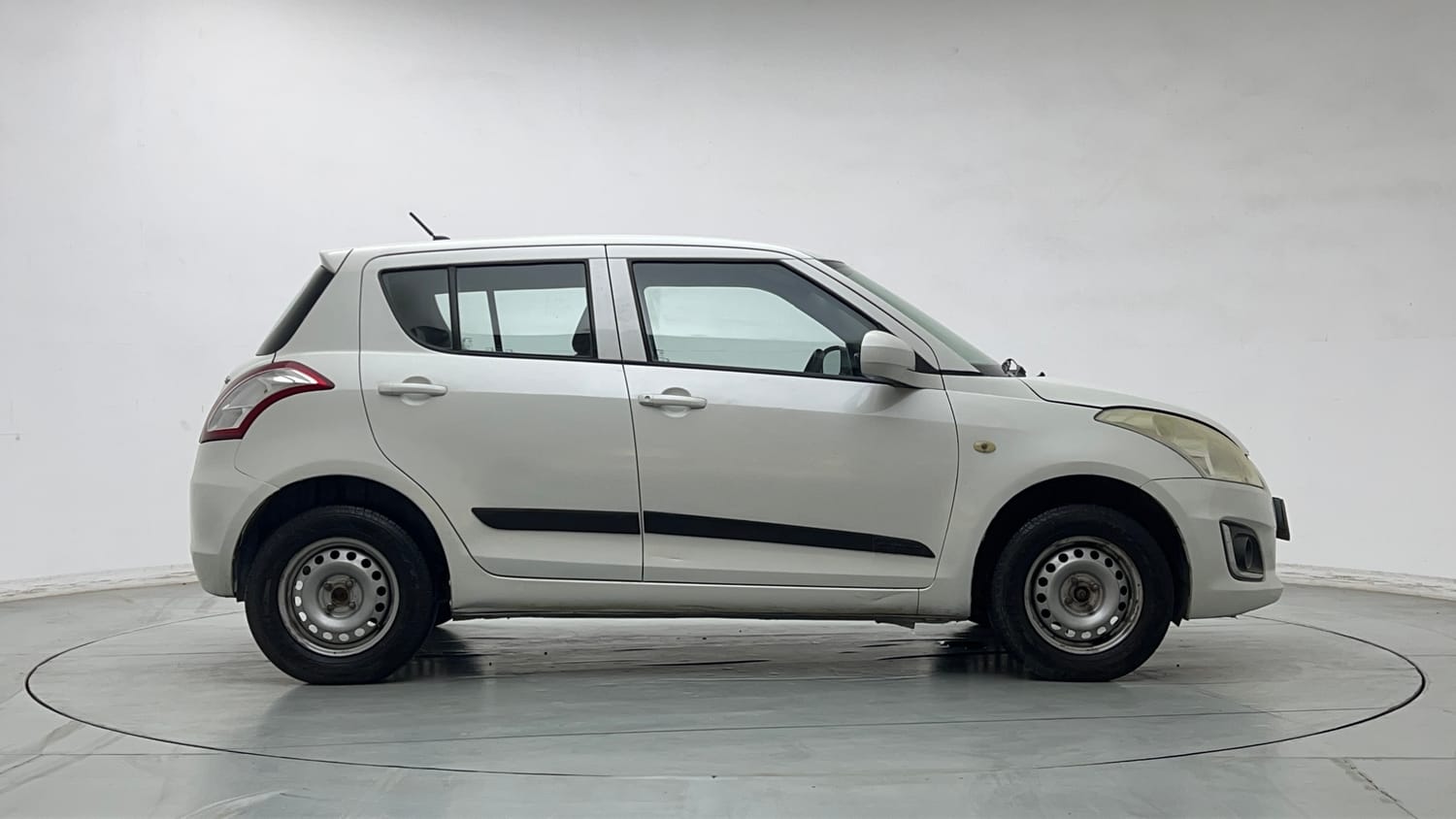 Used 2017 Maruti Suzuki Swift Lxi (O) Petrol Manual exterior RIGHT SIDE VIEW